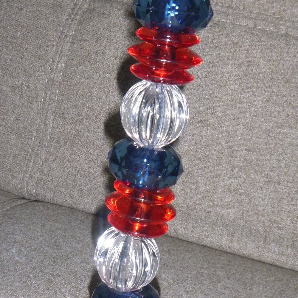 Red, white and blue beaded candle holder